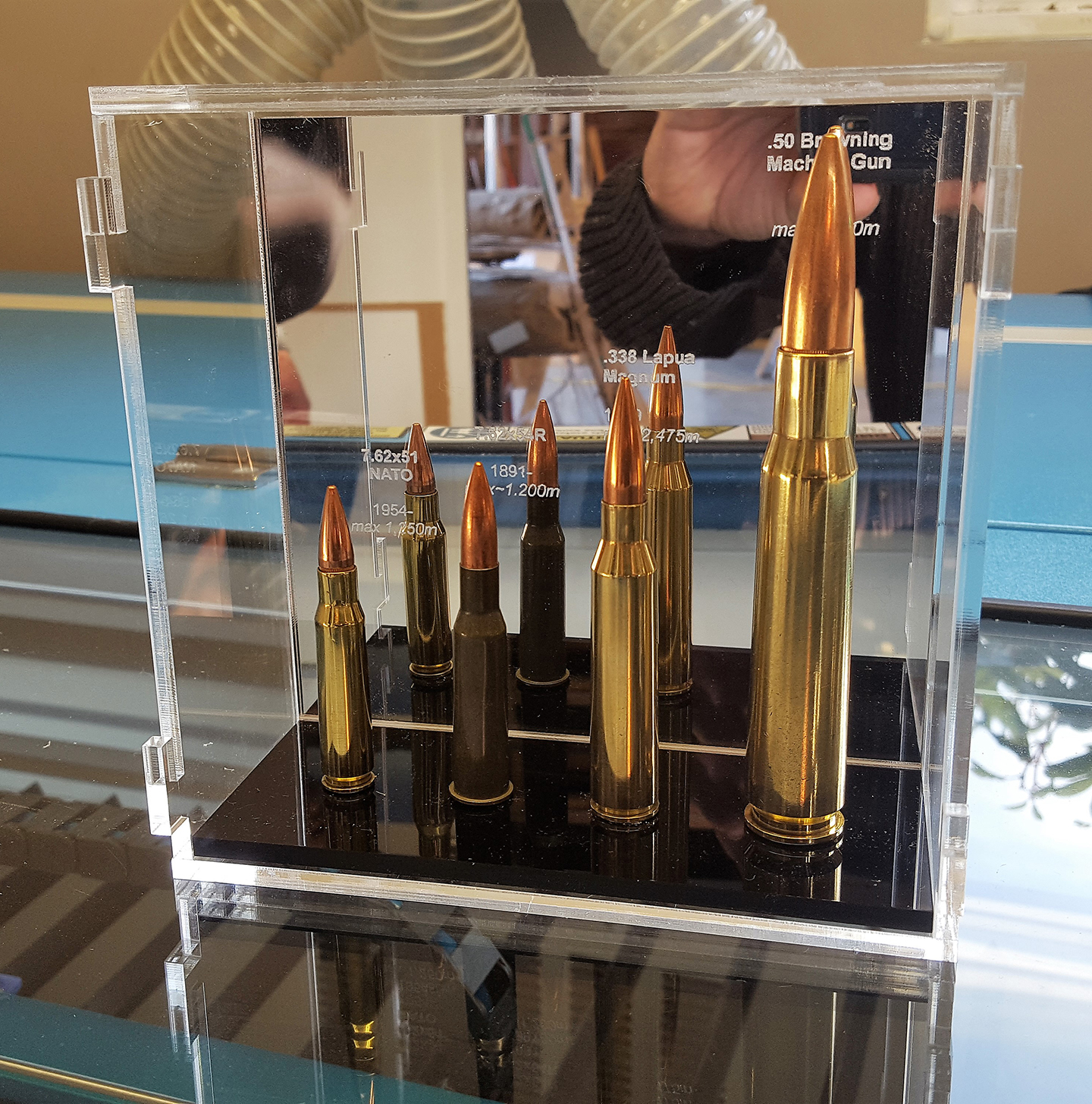 Bullet engraved display case